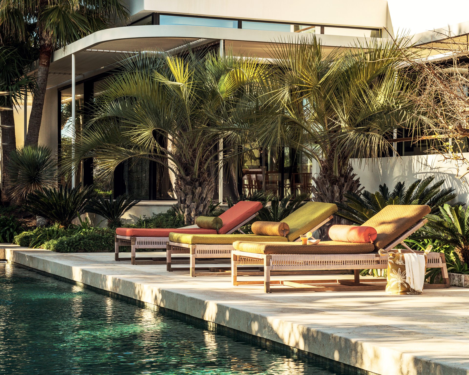 contemporary-miami-terrace-color-cushions-poolside-palms