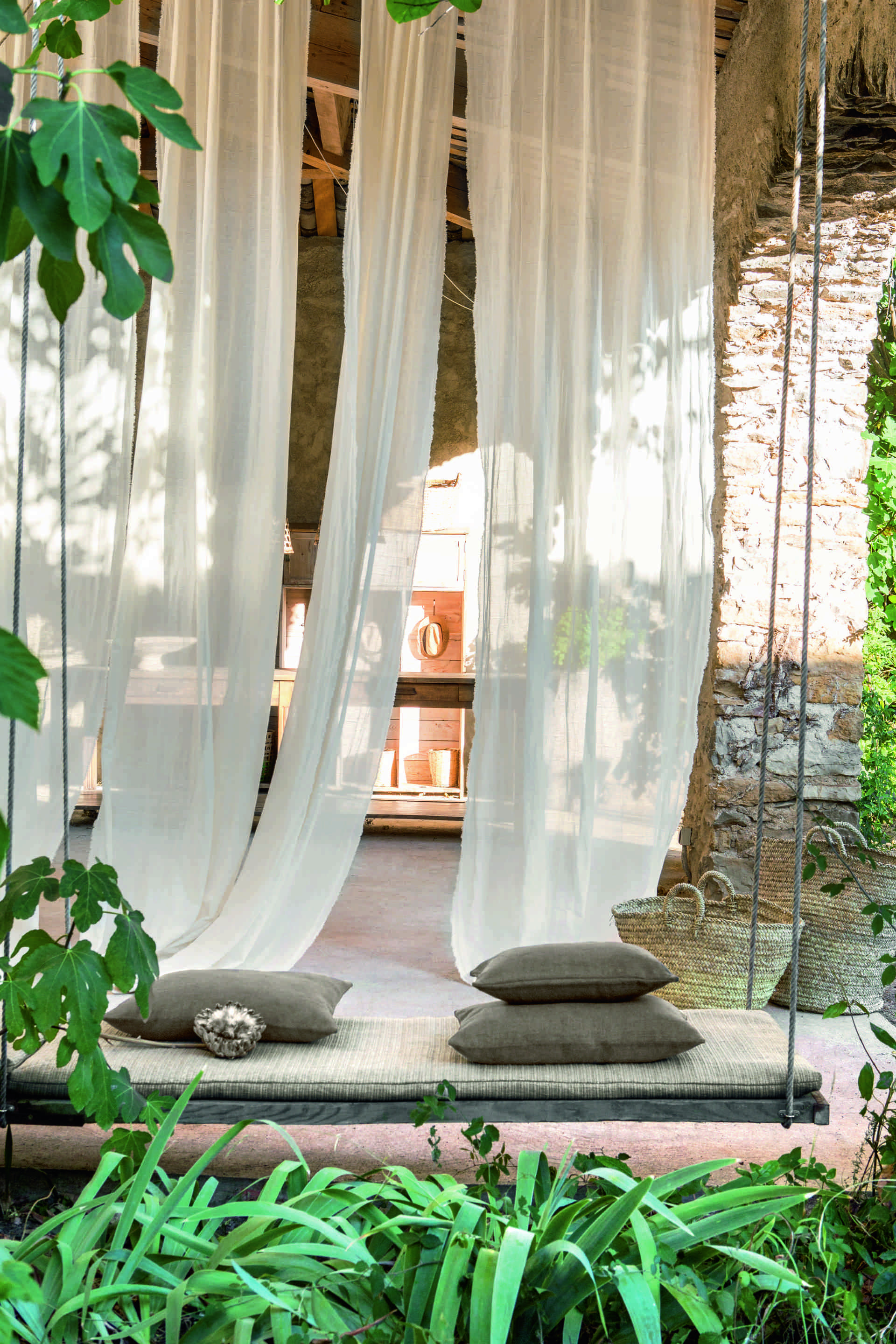 tulum-terrace-swing-wood-canopy-linen-mosquito-net